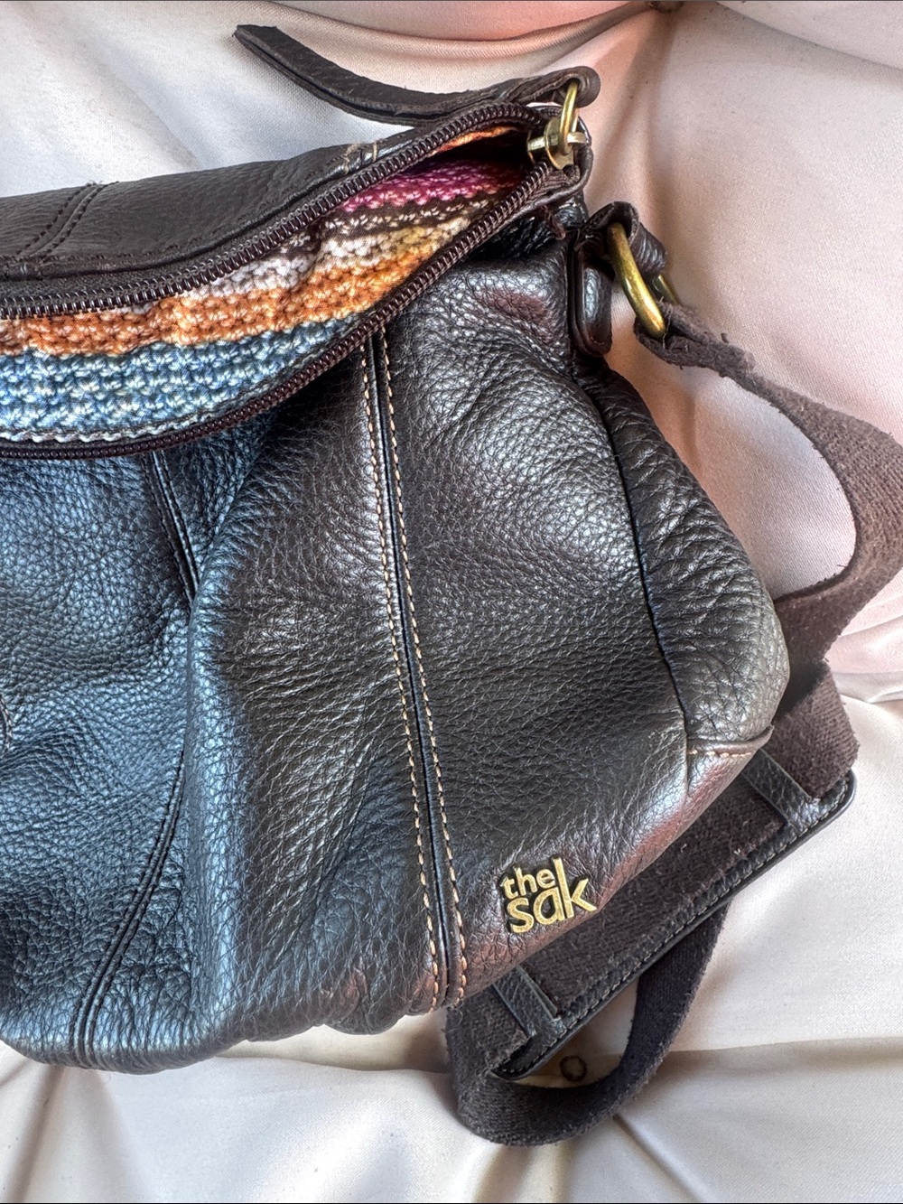 The Sak Black Leather Shoulder Bag with Multicolor Woven Trim